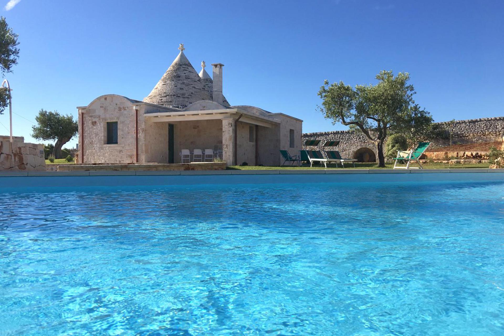 Private trullo with pool in olive orchard
