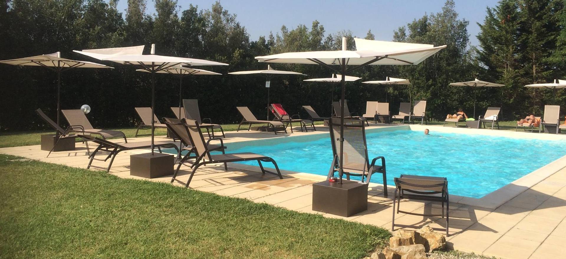 Agriturismo Tuscany Group accommodation in Tuscany with pool and dining area
